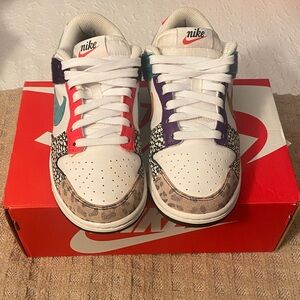 Nike Dunks. White Sneakers with Red, Purple, and Teal Accents